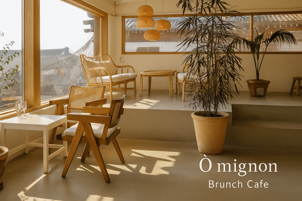 Interior of Ô mignon brunch café near Bulguksa Temple, featuring warm natural light, wooden furniture, and a calm seating space
